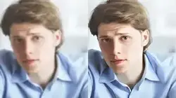 A man uses ai that unblurs photos to restore picture