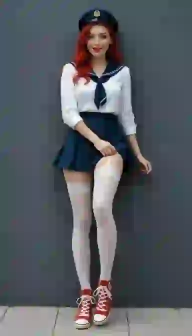 AI-generated full body portrait of a woman with red hair in sailor uniform: navy blue hat, white sailor shirt, navy blue pleated skirt, white sheer stockings and red converse.